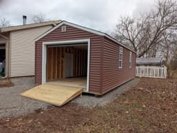 Amish-built garage with vinyl siding at a customer property in Southern Michigan