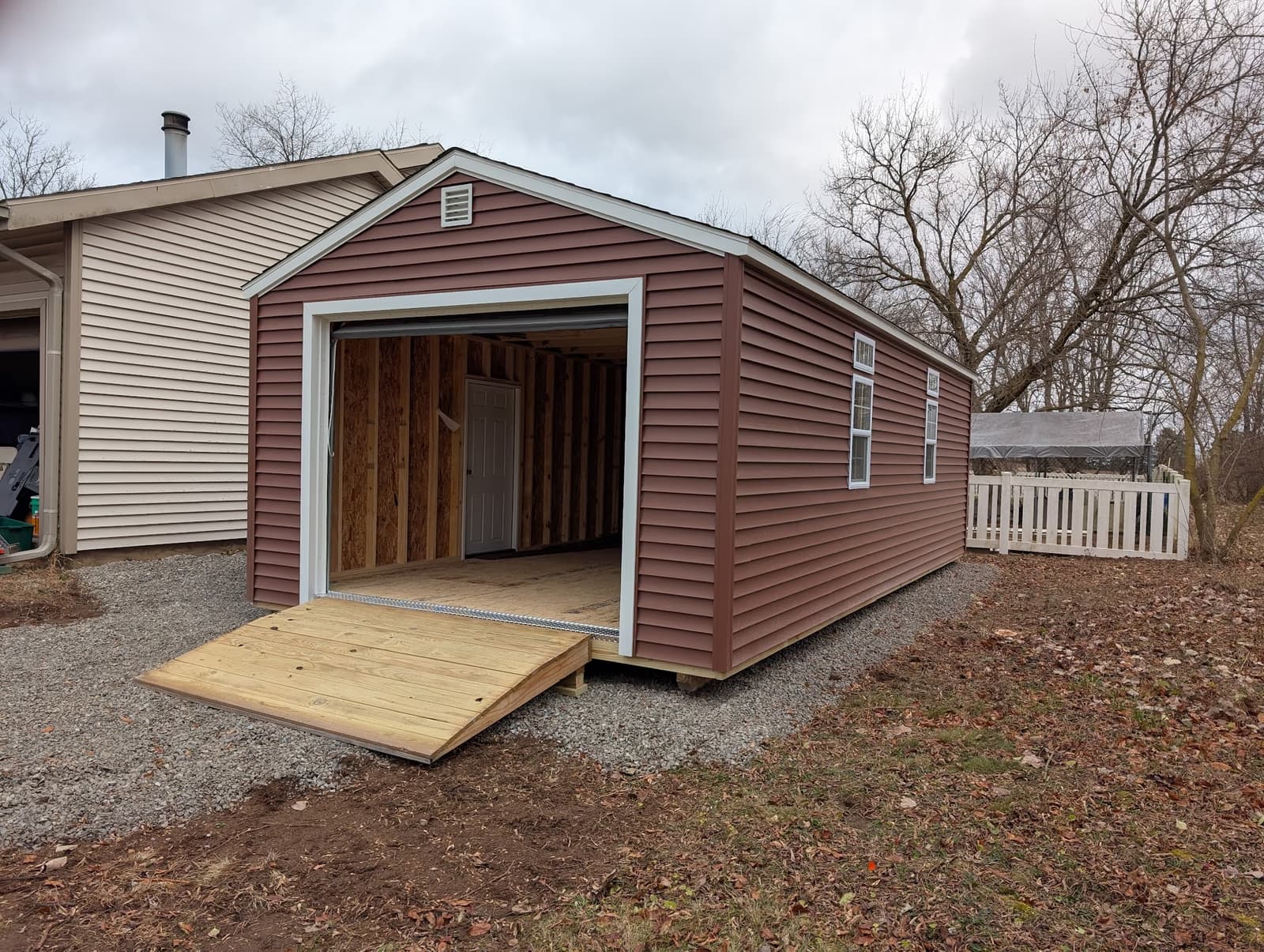 Amish-built garage delivered to a customer property