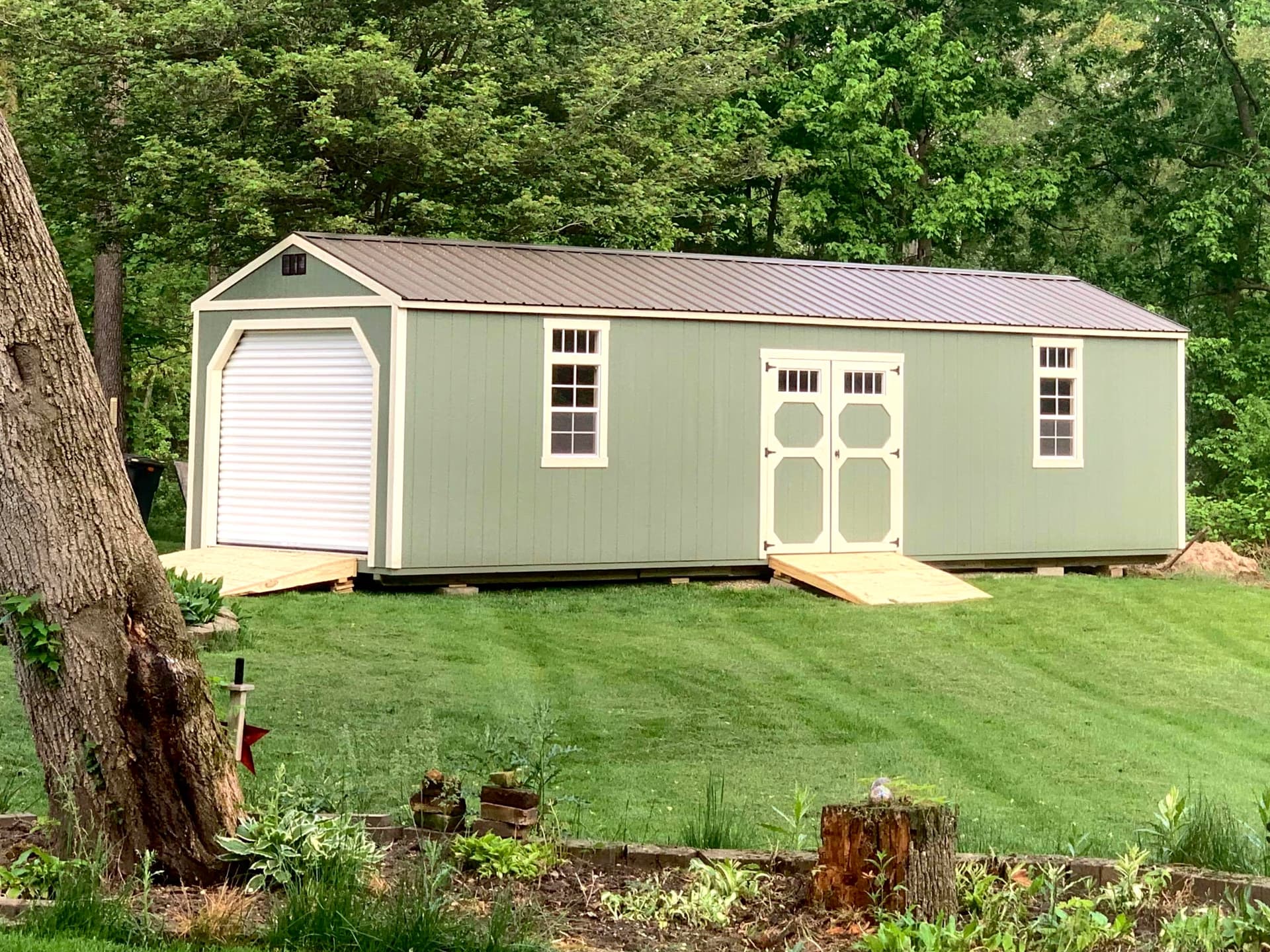 Amish-built garage on a customer property with mature trees