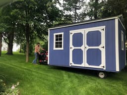 Amish-built garden shed with LP SmartSide siding at a customer property in Southern Michigan