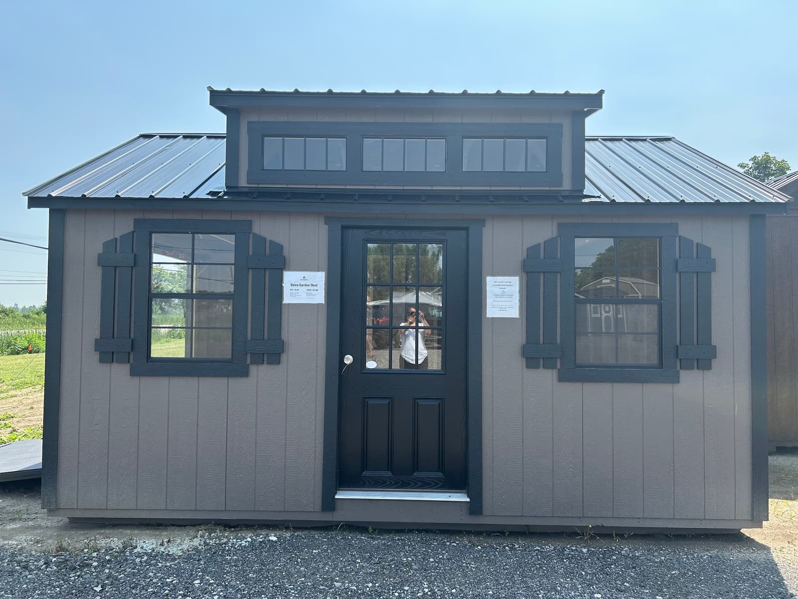 Customer garden shed with landscaping
