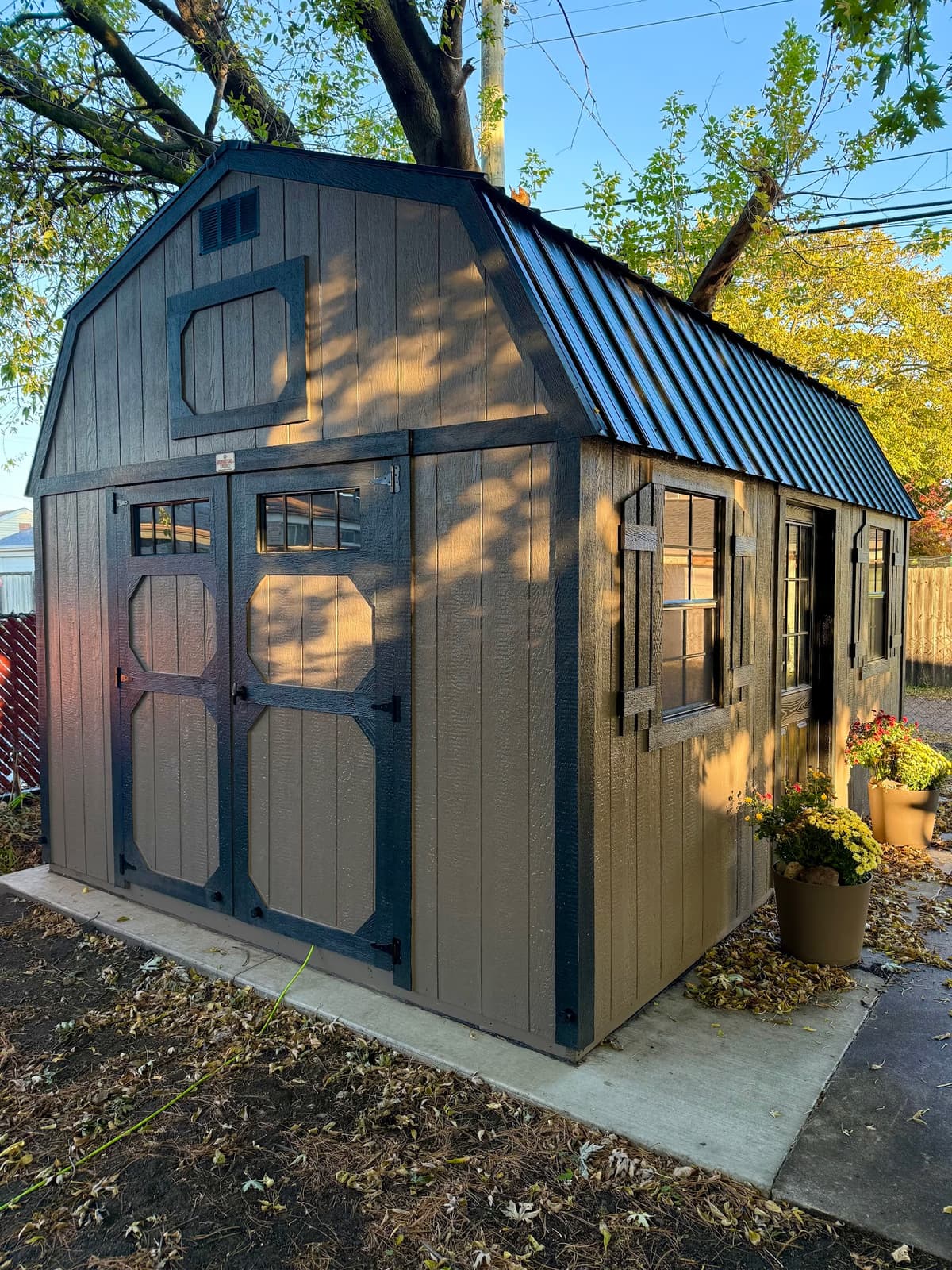 Amish-built lofted garden shed at customer property in Southern Michigan