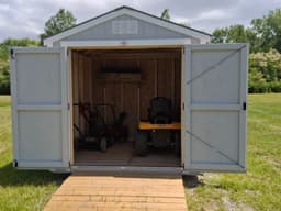 Amish-built utility shed with LP SmartSide siding at a customer property in Southern Michigan