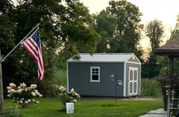 Amish-built utility shed with LP SmartSide siding at a customer property in Southern Michigan