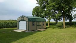 Amish-built lofted garden shed with LP SmartSide siding, representative display photo