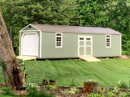 Amish-built garage with LP SmartSide siding, representative display photo