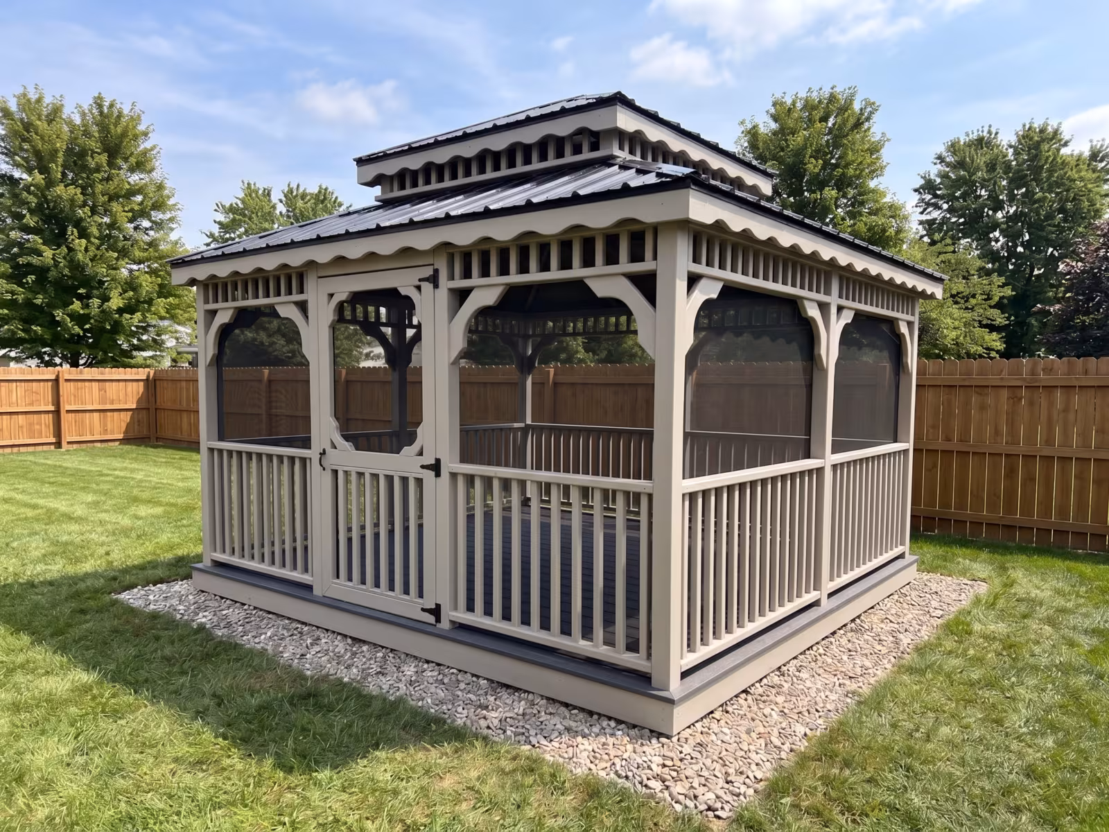 Tan Amish-built double-roof pavilion with screened panels in a fenced backyard