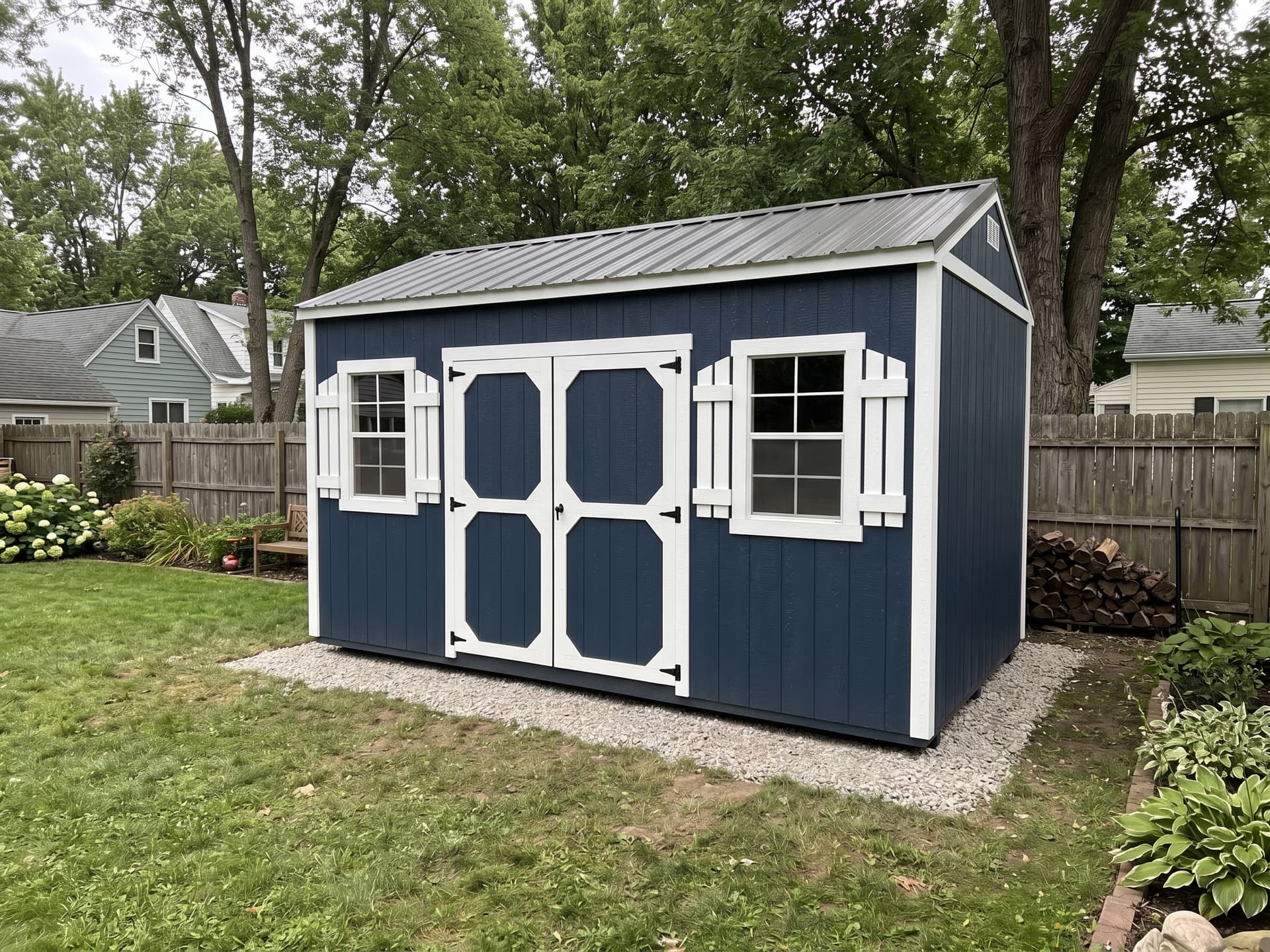 Amish-built garden shed in naval blue LP SmartSide on a Michigan property