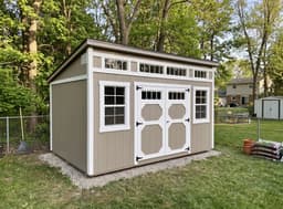 Amish-built studio shed with LP SmartSide siding, representative display photo