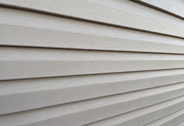 Horizontal vinyl lap siding close-up