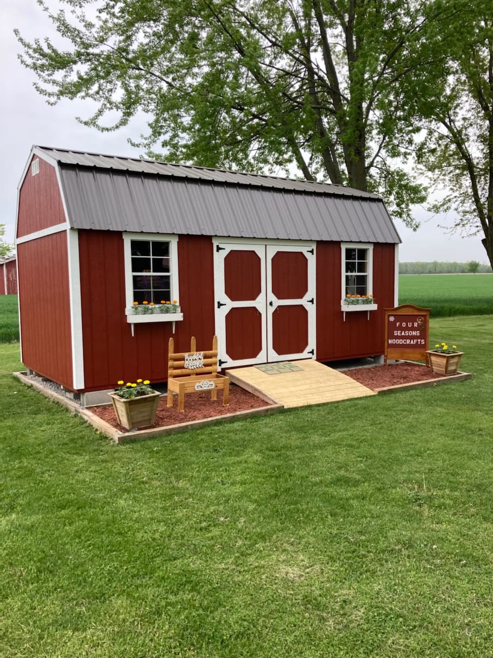Amish-built lofted garden shed at customer property in Southern Michigan