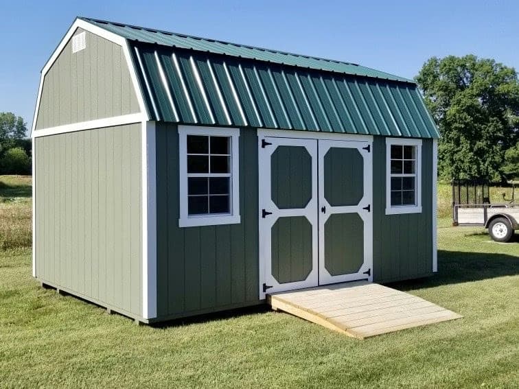 Amish-built lofted garden shed with ramp and windows